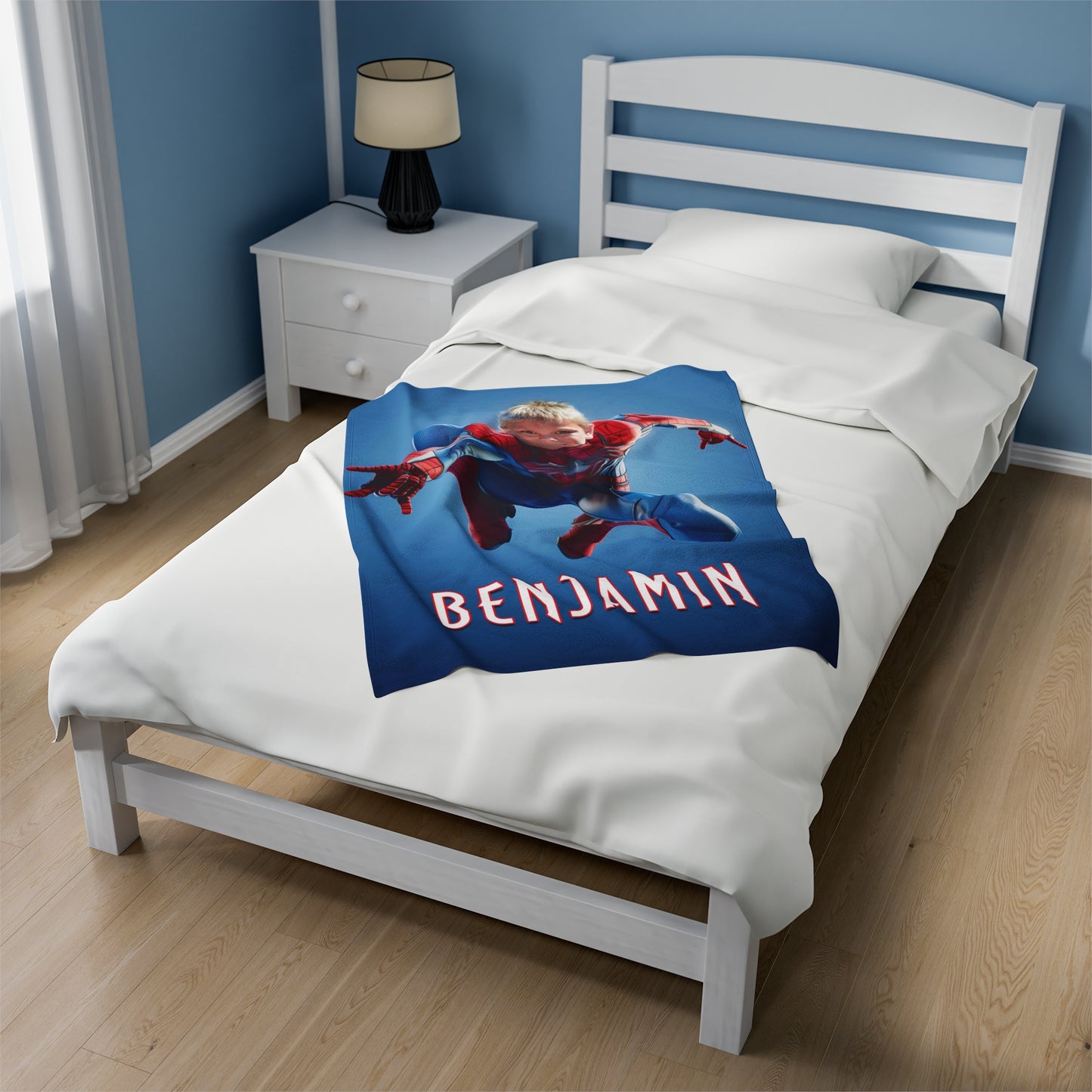 the 30 by 40 inch blanket showcased on a bed