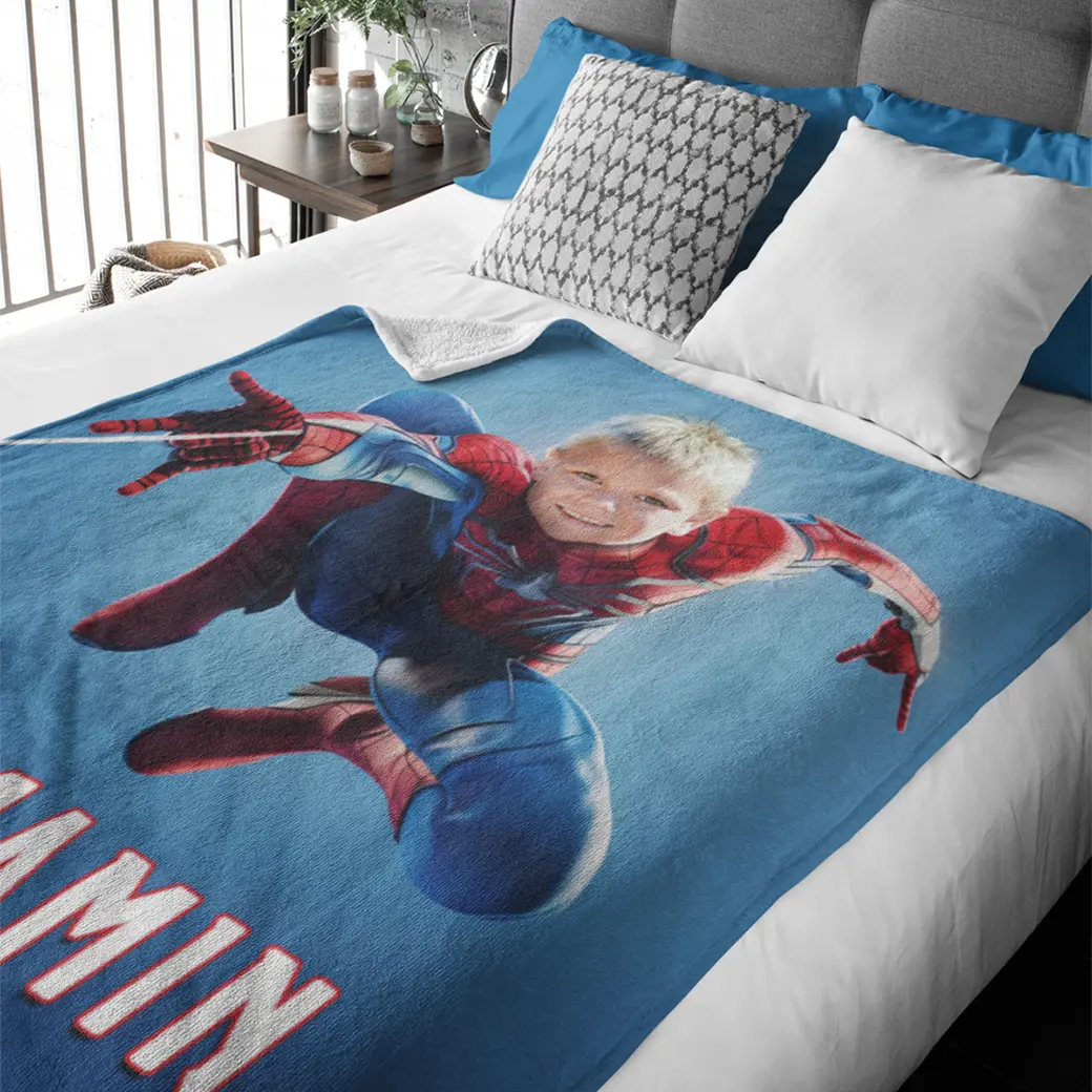 personalized superhero blanket on bed