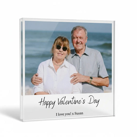 Acrylic glass photo block with a couple on a beach and 'Happy Valentine's Day' text.