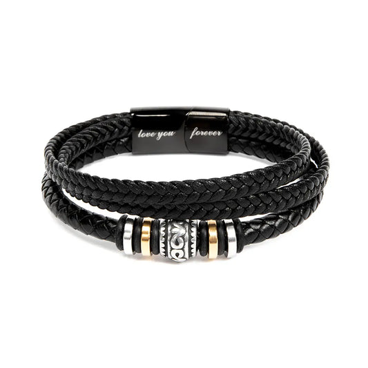 Engraved black braided leather bracelet with metal beads on a white background