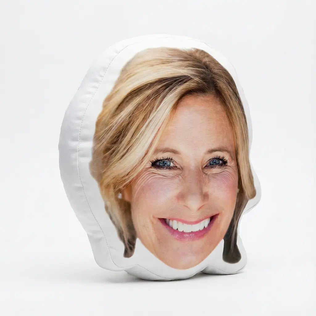 Custom face Pillow with a woman's face printed on it against a white background